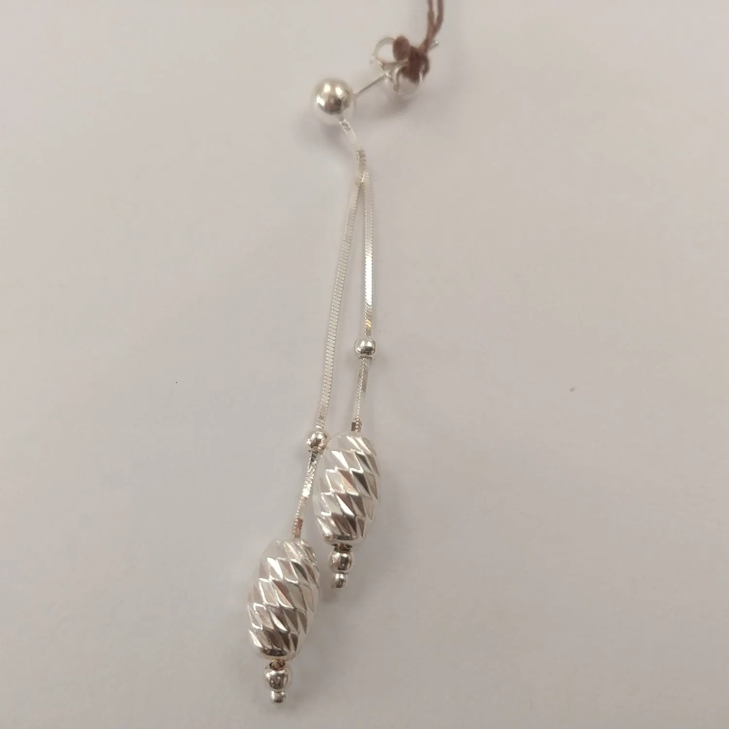 Orecchino Pendente con Semini