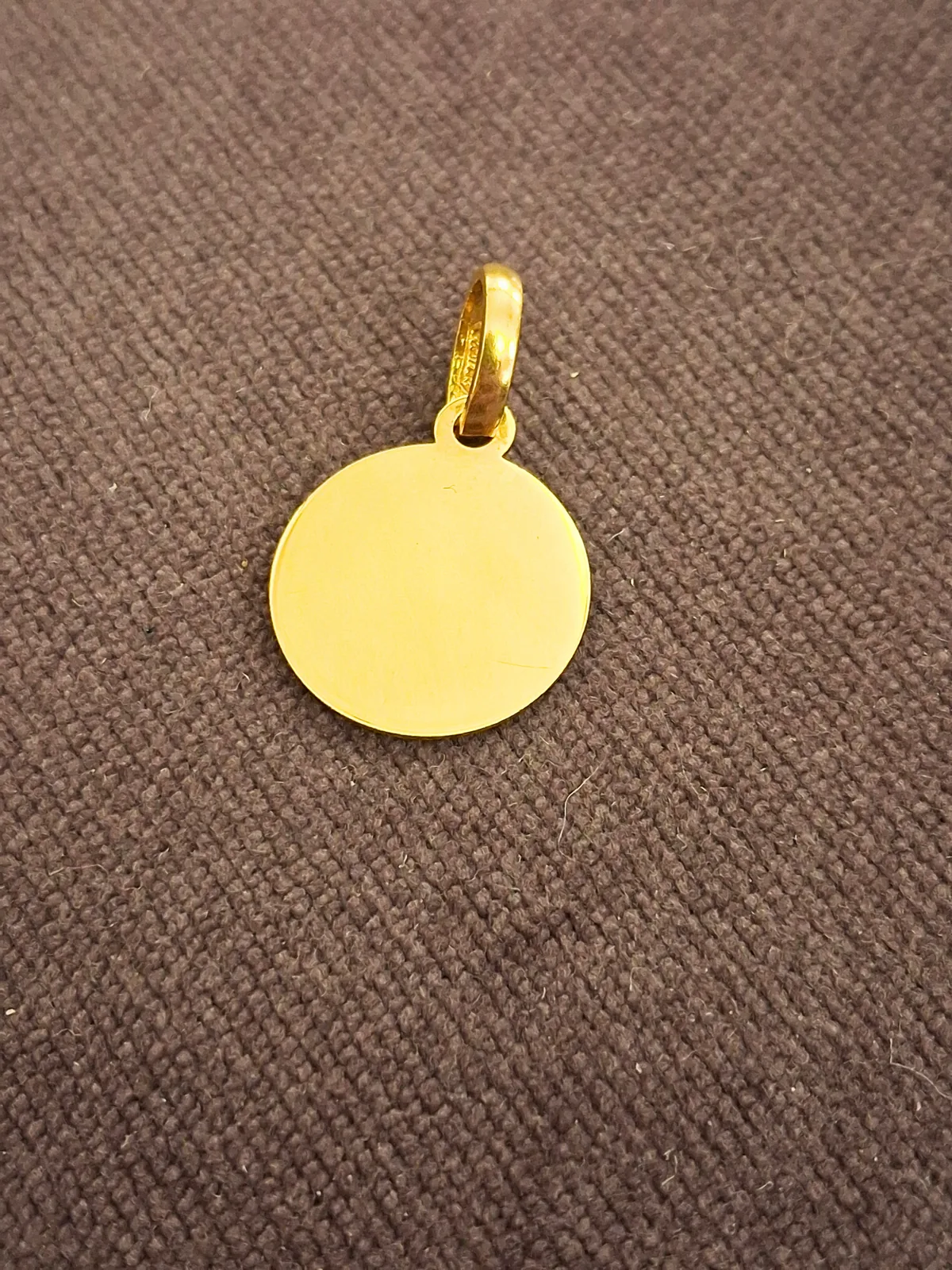 Medaglia con Angioletto di Raffaello
